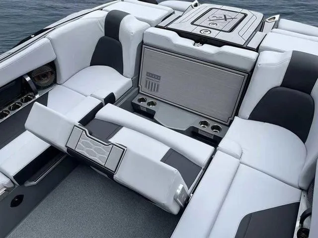 Slide: The Image of 2024 MasterCraft X24 boat interior with luxurious seating and modern design. - 7