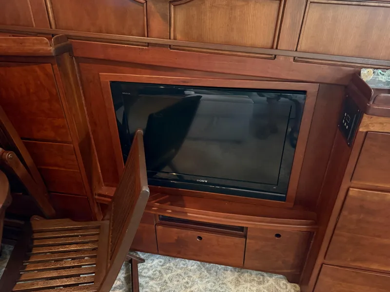 Slide: The Image of Built-in TV on a 2009 Custom Dutch Canal Barge with wooden cabinetry. - 14
