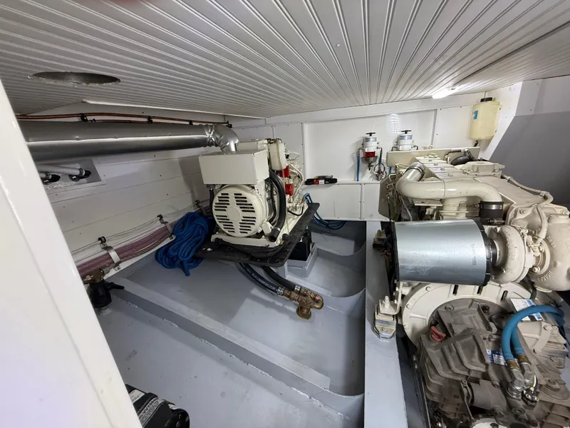 Slide: The Image of Engine room of a 2009 Custom Dutch Canal Barge with visible machinery and equipment. - 22