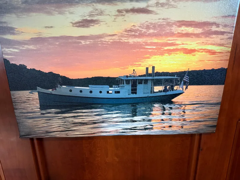 Slide: The Image of Custom Dutch Canal Barge at sunset on calm waters, 2009. - 3