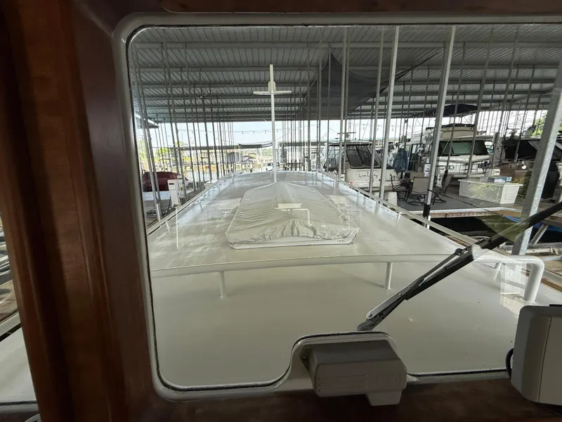 Slide: The Image of View from inside a 2009 Custom Dutch Canal Barge docked in a covered marina. - 9