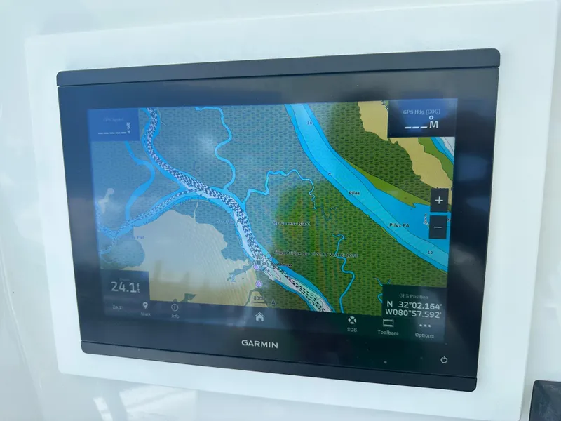 Slide: The Image of Garmin navigation display on 2009 Regulator 32FS boat, showing detailed marine map. - 6