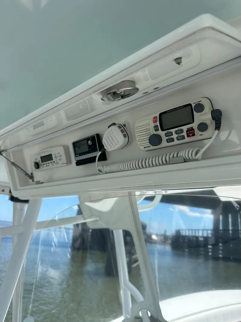 Slide: The Image of 2009 Regulator 32FS boat console with marine electronics and controls. - 7