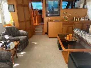 Slide: The Image of Luxurious interior of 1997 Ocean Alexander 548 yacht with elegant furnishings and decor. - 16
