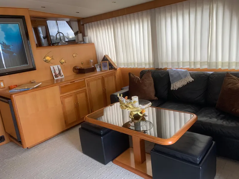 Slide: The Image of Luxurious 1997 Ocean Alexander 548 yacht interior with elegant seating and decor. - 17