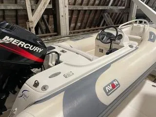 Slide: The Image of 1997 Ocean Alexander 548 boat with Mercury engine in a wooden boathouse. - 42