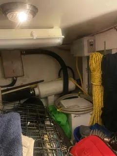 Slide: The Image of Interior of 1997 Ocean Alexander 548 yacht showing storage and equipment. - 48