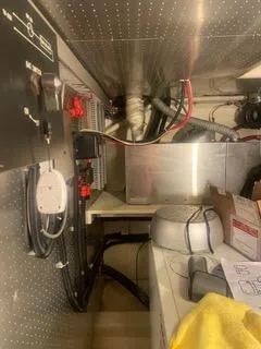 Slide: The Image of Engine room of 1997 Ocean Alexander 548 yacht with wiring and equipment. - 49