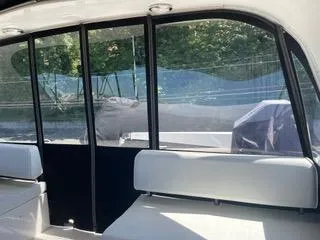 Slide: The Image of Interior view of 1997 Ocean Alexander 548 yacht with seating and windows. - 8