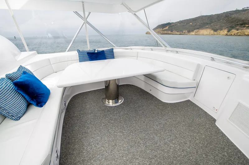 Slide: The Image of Luxurious seating area on a 2003 Donzi 65 Convertible yacht with ocean view. - 9