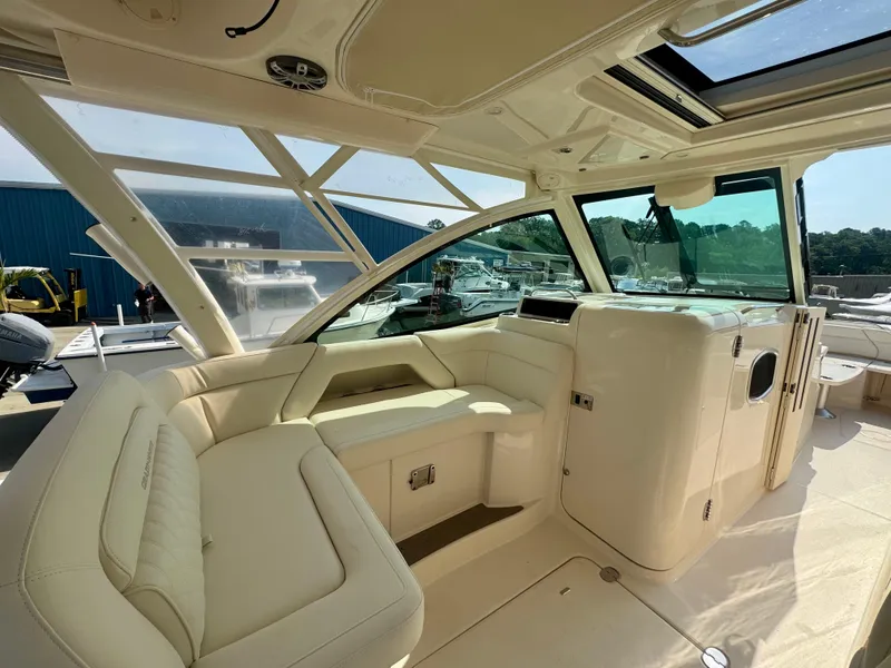 Slide: The Image of 2025 Grady-White Freedom 375 boat interior with luxurious seating and modern design. - 6