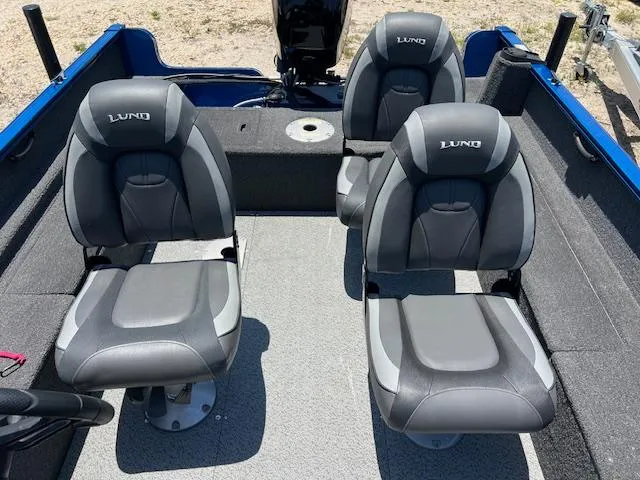 Slide: The Image of 2022 Lund 1650 Angler SS boat interior with two gray seats. - 3