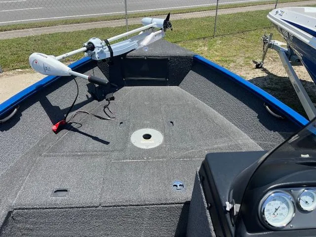 Slide: The Image of 2022 Lund 1650 Angler SS boat deck with trolling motor and gauges. - 8