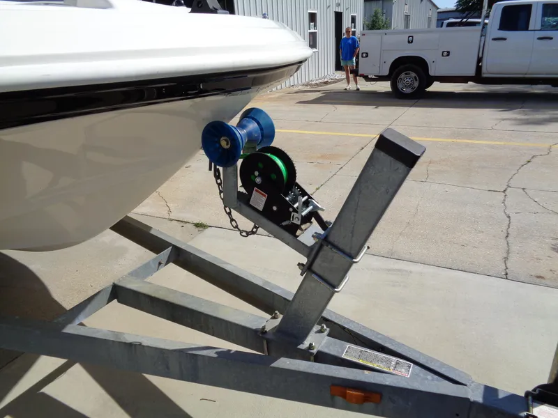 Slide: The Image of 2010 Hurricane FunDeck GS 188 OB boat on trailer with winch system. - 24