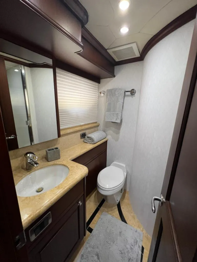 Slide: The Image of Luxurious bathroom in 2005 Pacific Mariner 85 yacht with elegant fixtures and modern design. - 27