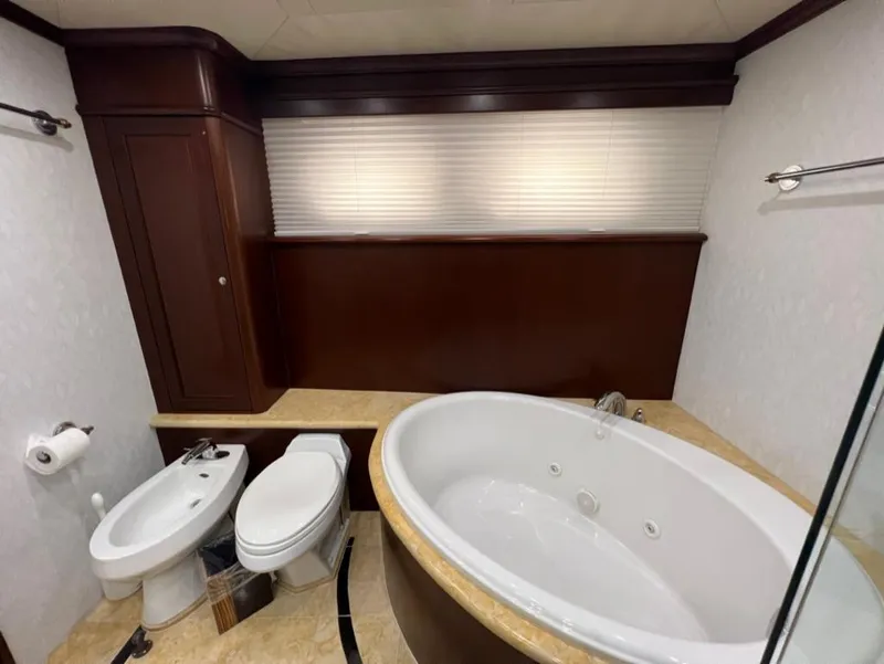 Slide: The Image of Luxurious bathroom in 2005 Pacific Mariner 85 yacht with jacuzzi tub and bidet. - 36