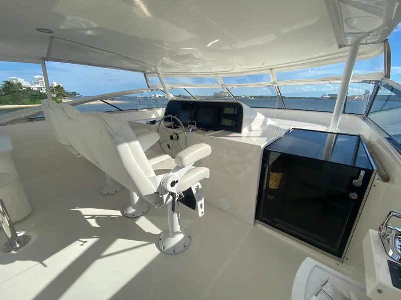 Slide: The Image of Luxurious 2005 Pacific Mariner 85 yacht helm with modern controls and panoramic views. - 43