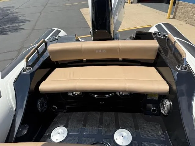 Slide: The Image of 2025 Brig Eagle 8 boat interior with tan seating and modern design. - 10