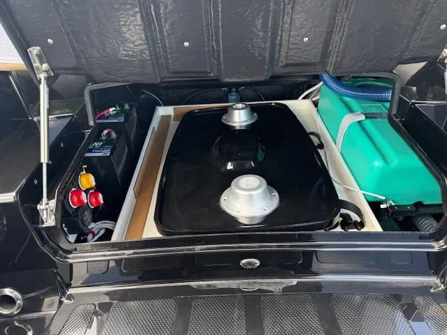 Slide: The Image of 2025 Brig Eagle 8 engine compartment with battery and fuel tank. - 17