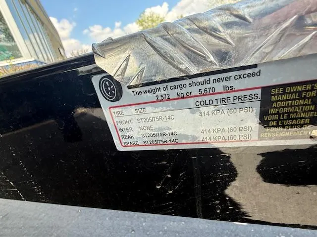 Slide: The Image of Sticker on Brig Eagle 8, 2025 model, showing tire pressure and cargo weight limits. - 23