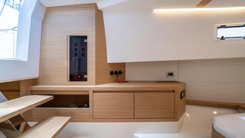 Slide: The Image of 2023 Pardo Yachts 38 on water, sleek design, open deck, tropical backdrop. - 10