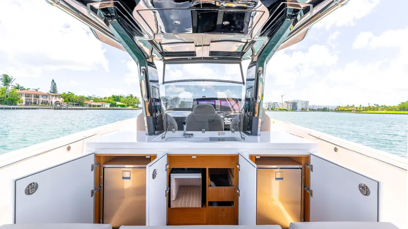 Slide: The Image of 2023 Pardo Yachts 38 cruising on vibrant blue ocean waters. - 16