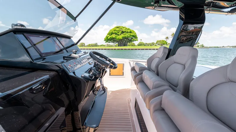 Slide: The Image of 2023 Pardo Yachts 38 luxury boat on clear blue water. - 19