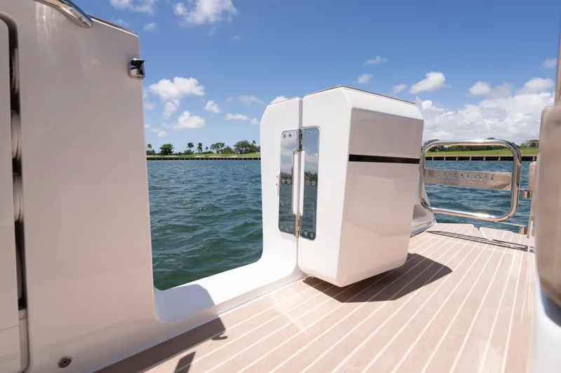 Slide: The Image of 2023 Pardo Yachts 38, open deck view, sunny day, calm waters. - 23