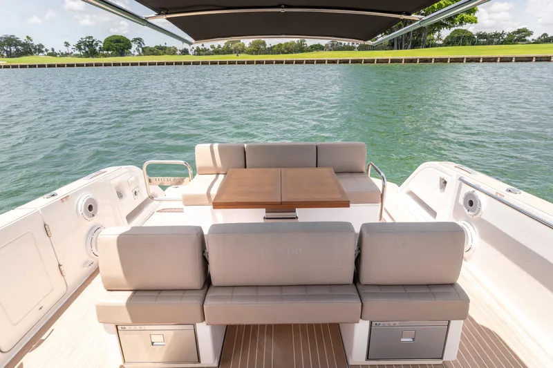 Slide: The Image of Luxury seating area on 2023 Pardo Yachts 38, overlooking serene waters. - 29