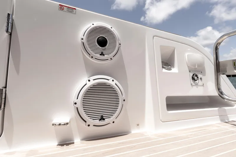 Slide: The Image of 2023 Pardo Yachts 38, featuring sleek white speakers and modern deck design. - 30