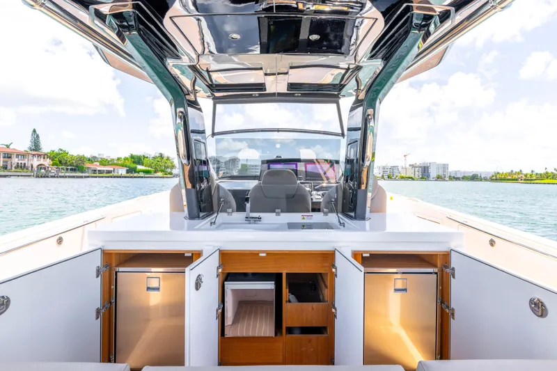 Slide: The Image of 2023 Pardo Yachts 38 interior with open storage, sleek design, and waterfront view. - 35