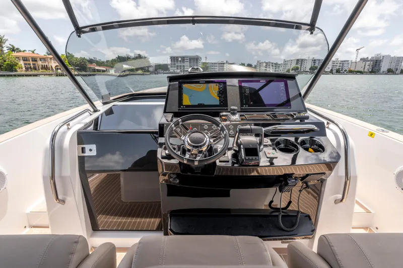 Slide: The Image of Helm of 2023 Pardo Yachts 38 with modern navigation systems and luxurious design. - 37