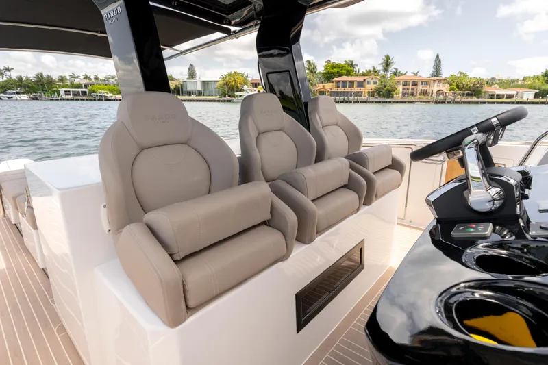 Slide: The Image of Luxurious 2023 Pardo Yachts 38 interior with plush seating and sleek steering console. - 41