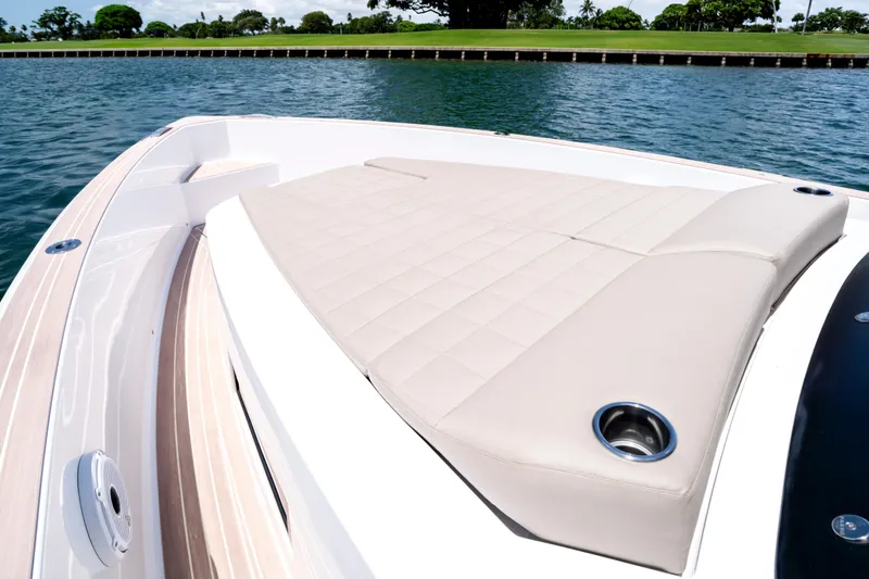 Slide: The Image of 2023 Pardo Yachts 38 with luxurious sunbed on calm waters. - 42