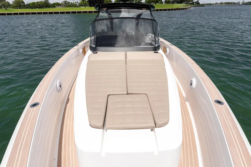 Slide: The Image of 2023 Pardo Yachts 38 with beige sunbed, cruising on calm waters. - 44