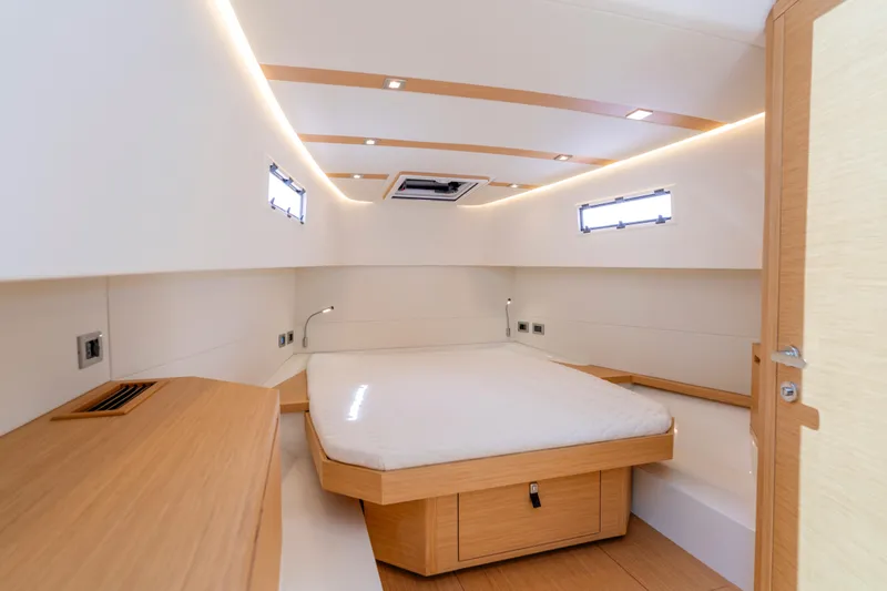 Slide: The Image of Luxurious cabin interior of 2023 Pardo Yachts 38, featuring modern design and wood accents. - 47