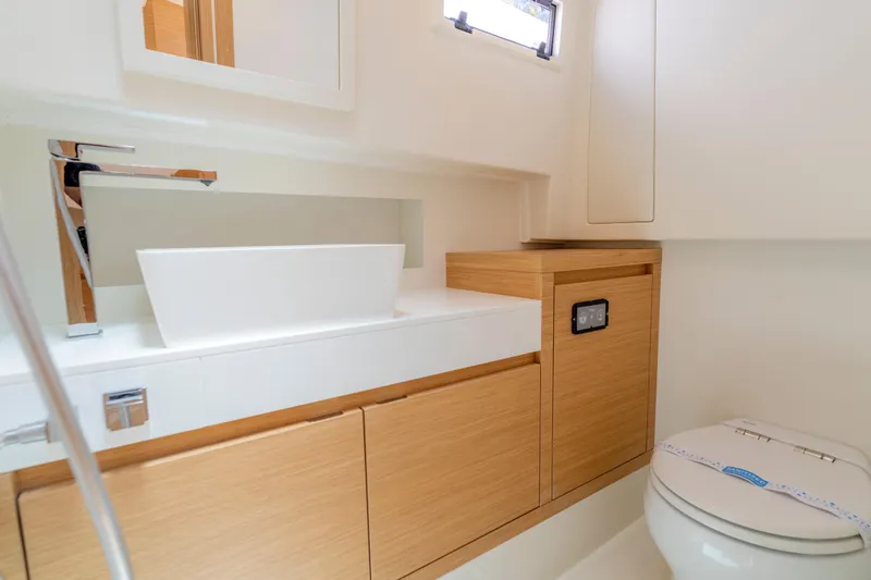 Slide: The Image of Modern bathroom interior of 2023 Pardo Yachts 38, featuring sleek sink and toilet design. - 54