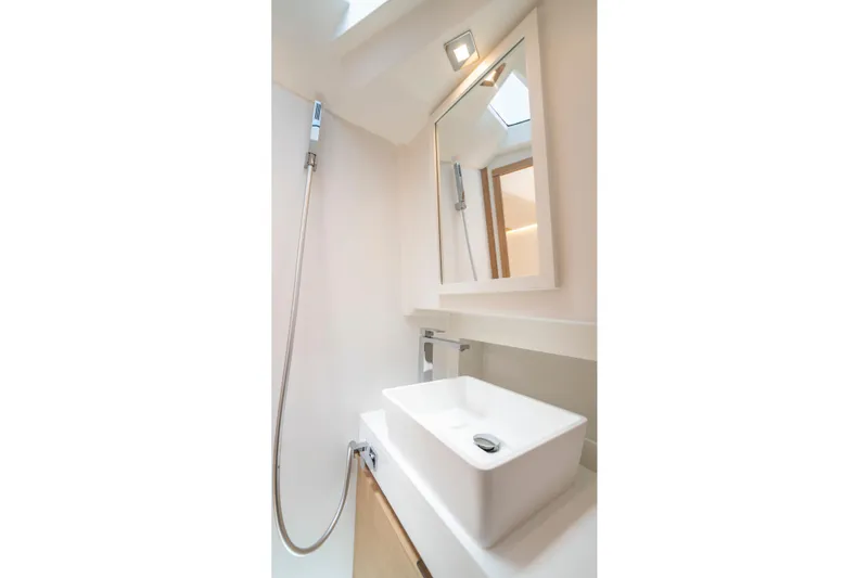 Slide: The Image of Modern bathroom interior in 2023 Pardo Yachts 38, featuring sleek sink and mirror. - 56