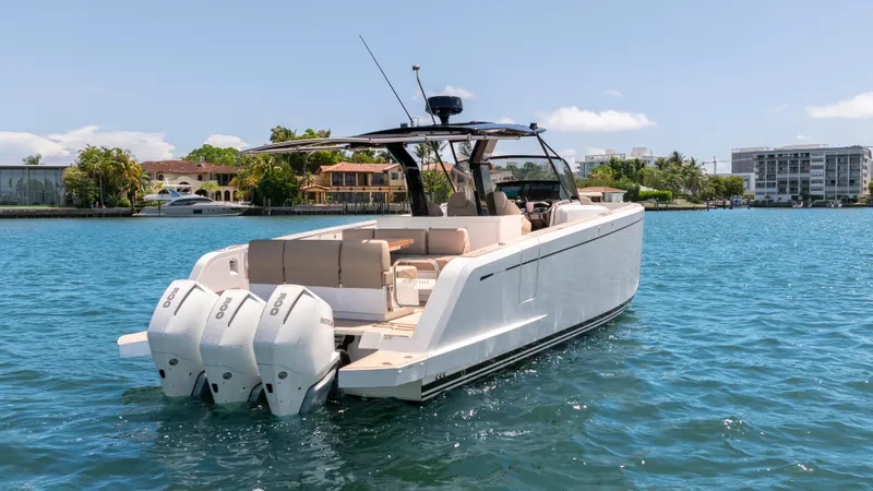 Slide: The Image of 2023 Pardo Yachts 38, aerial view, sleek design on sparkling blue water. - 7