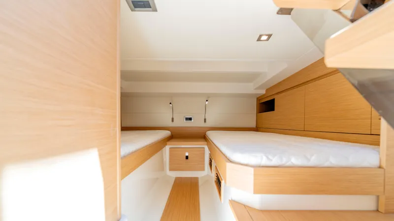 Slide: The Image of 2023 Pardo Yachts 38 on clear blue water, showcasing sleek design and triple engines. - 8