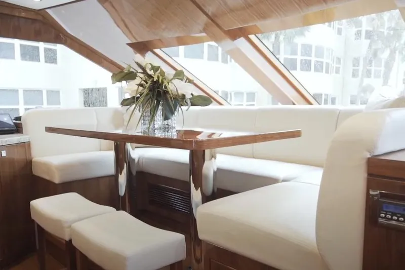 Slide: The Image of Luxurious interior of 2017 Hargrave Raised Pilothouse MY yacht with elegant seating and table. - 11