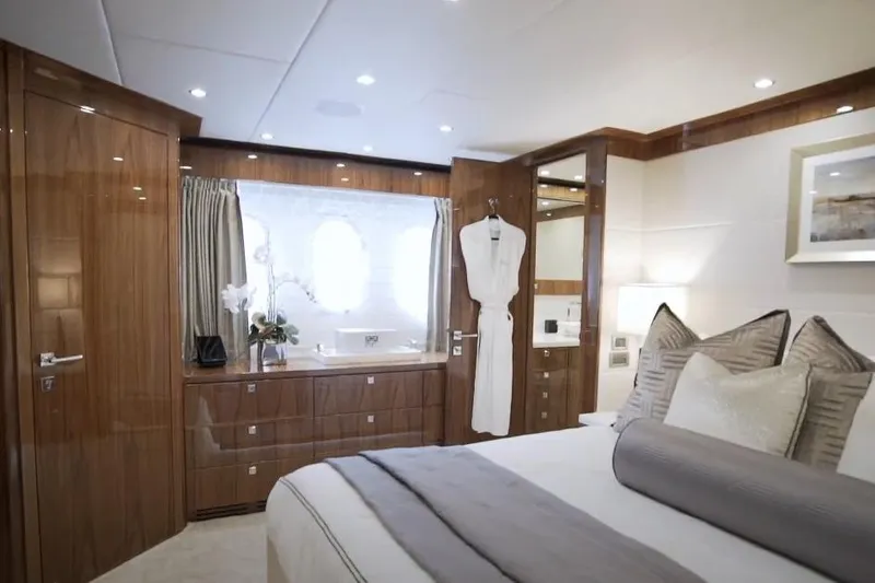 Slide: The Image of Luxurious bedroom interior of 2017 Hargrave Raised Pilothouse MY yacht, featuring elegant wood finishes. - 15
