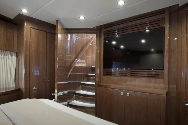 Slide: The Image of Luxurious interior of 2017 Hargrave Raised Pilothouse MY yacht with wood paneling and TV. - 19
