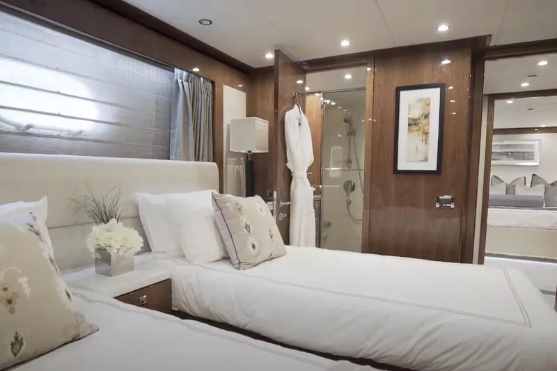 Slide: The Image of Luxurious 2017 Hargrave Raised Pilothouse MY yacht bedroom with twin beds and elegant decor. - 21