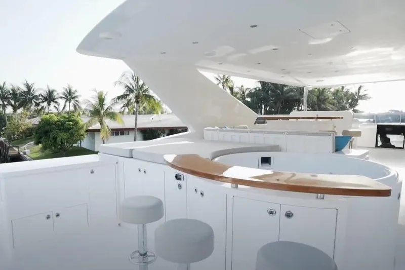Slide: The Image of Luxurious 2017 Hargrave Raised Pilothouse MY yacht deck with bar and seating area. - 25