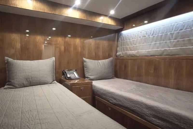 Slide: The Image of Luxurious twin cabin in 2017 Hargrave Raised Pilothouse MY yacht, featuring wood paneling and modern lighting. - 30