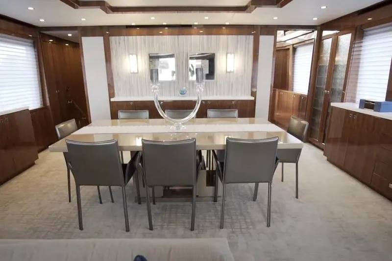 Slide: The Image of Luxurious dining area in 2017 Hargrave Raised Pilothouse MY yacht, featuring elegant decor. - 7