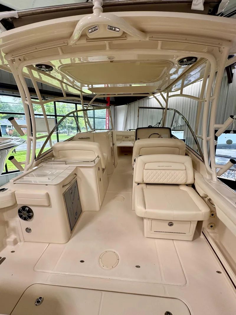 Slide: The Image of 2025 Grady-White Freedom 285 boat interior with seating and helm station. - 4