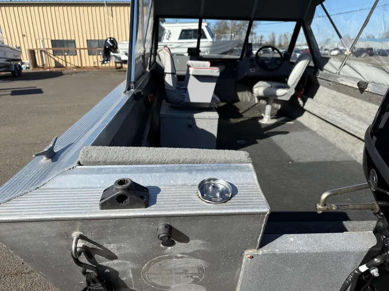 Slide: The Image of Open storage compartment in a 1987 Duckworth Pro Steelhead boat interior. - 12