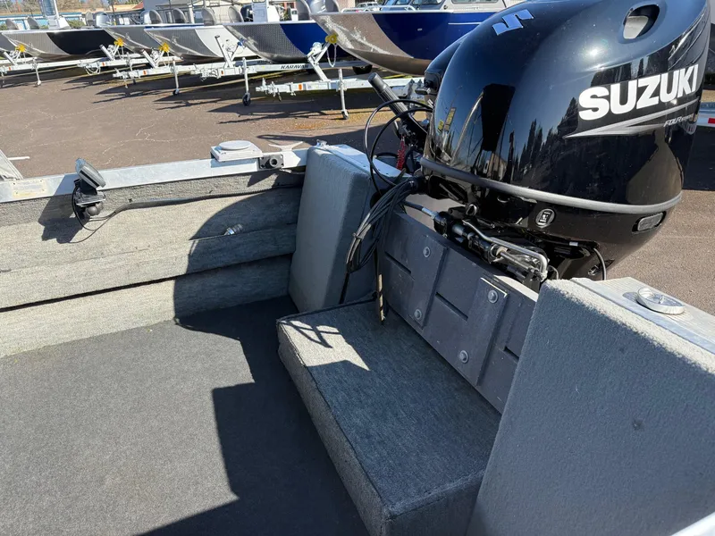 Slide: The Image of 1987 Duckworth Pro Steelhead boat interior with two seats and steering wheel. - 13